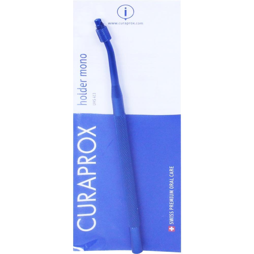 Blauer Zahnzwischenraumbürstenhalter in einer blauen Verpackung.